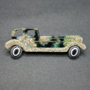 Lea Stein green-gold limousine brooch