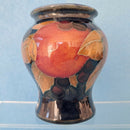 A Moorcroft Vase in the Pomegranate Design by William Moorcroft