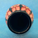 A Moorcroft Vase in the Violet Design by Sally Tuffin.