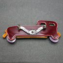 Lea Stein maroon-tan limousine brooch