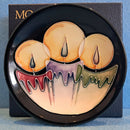 A Moorcroft Pin Dish in the Candlelight Design by Nicola Slaney