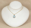 9ct Gold London Blue Topaz & Diamond Pendant and Gold Chain.