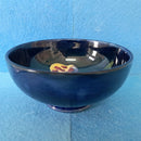 A Moorcroft Footed Bowl in the Orchid Design by Walter Moorcroft
