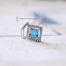 18ct White Gold Blue Topaz & Diamond Pendant