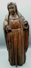 A Tudor Period Carved Oak Figure Of The Madonna.