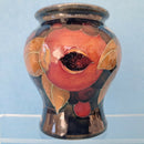 A Moorcroft Vase in the Pomegranate Design by William Moorcroft