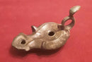 A Roman Bronze Ring Handled Oil Lamp.