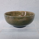 A Moorcroft Small Footed Bowl in the Columbine Design by Walter Moorcroft.
