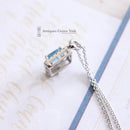 18ct White Gold Blue Topaz & Diamond Pendant