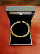 A Bronze Age Bracelet With Dragons head Terminals.