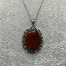 Arts and Crafts style silver and cornelian pendant necklace