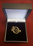 A Celtic Bronze ,Openwork Spiral War Trumpet Cloak Brooch.