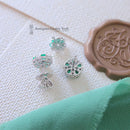18ct White Gold Emerald & Diamond Cluster Earrings by Luke Stockley London