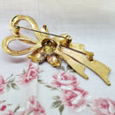 Gold Tone Pink Enamel Bow Brooch