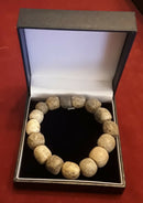 A Restrung Mammoth Bone Beaded Bracelet.