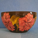 A Moorcroft Oval Bowl in Hibiscus Design by Walter Moorcroft