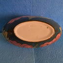 A Moorcroft Oval Bowl in Hibiscus Design by Walter Moorcroft