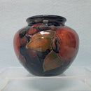A Moorcroft Vase c1918-1926 in the Pomegranate Design by William Moorcroft