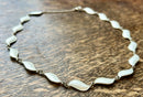 Modern Mid Century Aksel Holmsen Sterling Silver Gilt Snowdrop White Enamel Leaf Necklace