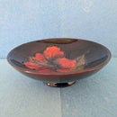 A Moorcroft Flambé Footed Bowl. Early Hibiscus Design by Walter Moorcroft.