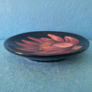 A Moorcroft Pin Dish in the May Lily Design by Emma Bossons