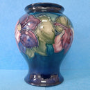 A Moorcroft Vase (5.78inch) in the Clematis Design by Walter Moorcroft