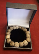 A Restrung Mammoth Bone Beaded Bracelet.