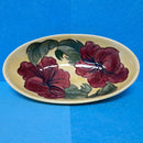 A Moorcroft Oval Bowl in the Hibiscus Design by Walter Moorcroft
