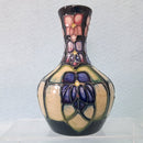 A Small Moorcroft Vase in the Violet Design by Sally Tuffin