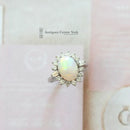 18ct White Gold Opal & Diamond Oval Cluster Ring