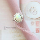 18ct White Gold Opal & Diamond Oval Cluster Ring