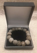A Mammoth Bone Restrung Beaded Bracelet.