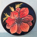 A Moorcroft Pin Dish in the Anemone Design