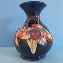 A Moorcroft Vase (6.02inch) Orchid Design by Walter Moorcroft