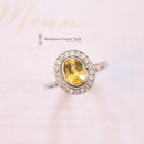 Platinum Yellow Sapphire & Diamond Oval Cluster Ring