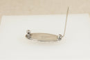 Art Deco Silver Butterfly Wing Brooch by T.L. Mott – “Desert Island” Scene