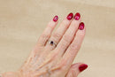 Elegant Sterling Silver Rhodolite Garnet Twist Ring