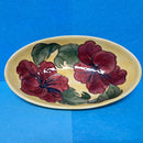 A Moorcroft Oval Bowl in the Hibiscus Design by Walter Moorcroft