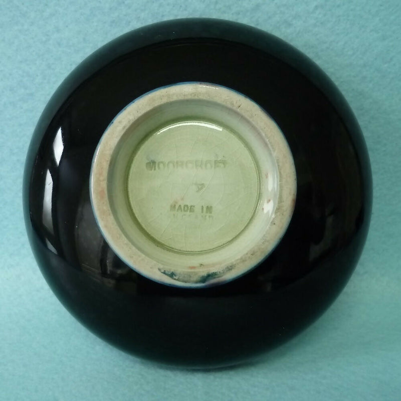 A Moorcroft Flambé Bowl in the Orchid Pattern by Walter Moorcroft
