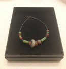 An Anglo Saxon Ladies Restrung Group Of Glass / Amber Beads.