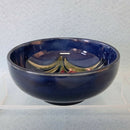 A Small Moorcroft Footed Bowl in the Freesia Design by Walter Moorcroft