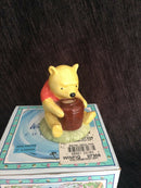 Royal Doulton Winnie The Pooh figurine Royal Doulton Winnie The Pooh and the honeypot figurine WP1
