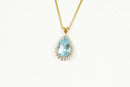9ct Gold London Blue Topaz & Diamond Pendant and Gold Chain.
