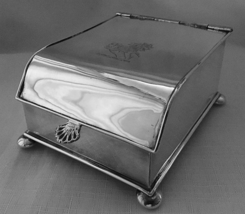Georgian, Sheffield Plated crested inkstand raised on four bun feet. Circa 1820 - 1830.