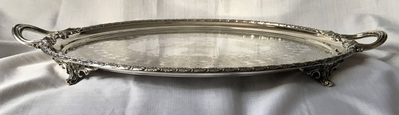 Early Victorian twin handled, silver plated and crested oval serving tray. Thomas Wilkinson, circa 1840 - 1860.
