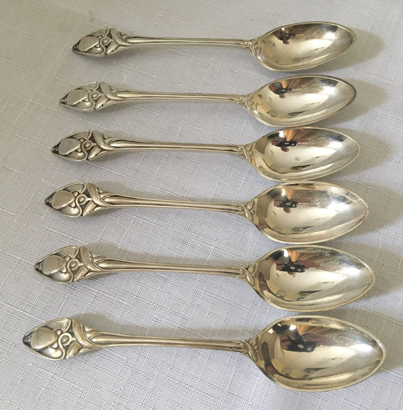 Cased set of six silver plated Art Nouveau teaspoons.