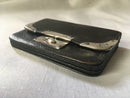 Victorian silver mounted black leather purse. London 1899 Thomas De La Rue & Co.