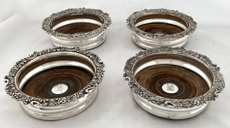 Georgian, George IV, Four Crested Old Sheffield Plate Wine Coasters. Circa 1820 - 1830.