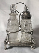 Georgian, George III, silver cruet stand with later silver mounted cut glass bottles. Circa 1784 - 1821. 4.9 troy ounces.