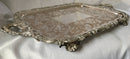 Georgian, George IV period, twin handled Old Sheffield Plate serving tray on four ornate feet. Circa 1820 - 1830.